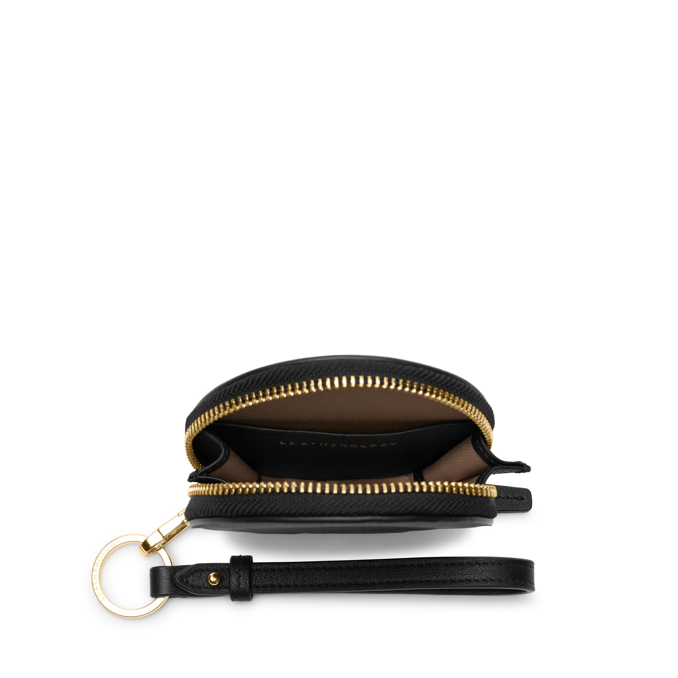 Portable Wristlet Round Pouch | Full grain leather, compact carry